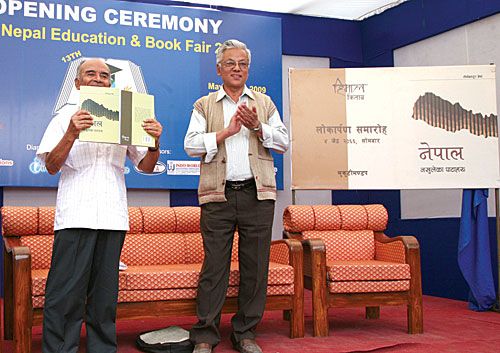 HOT OFF THE PRESS: Senior journalist Bhairab Risal releases Tirtha Bahadur Shrestha's collected writings in a book titled Nepal: Nakhuleka Pataharu, at the 13th Education and Book Fair on Monday.