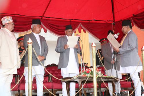 SWORN IN: Newly elected prime minister, Madhav Kumar Nepal takes his oath of office, administered by President Ram Baran Yadav amidst a special function at Shital Niwas on Monday.