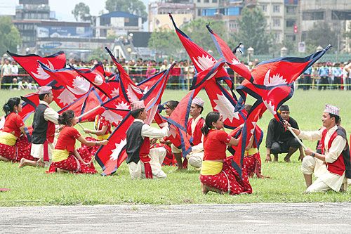FLAG BEARERS: Nepal Police perform traditional dances during a celebration to mark the first Republic day at Tundikhel last week.