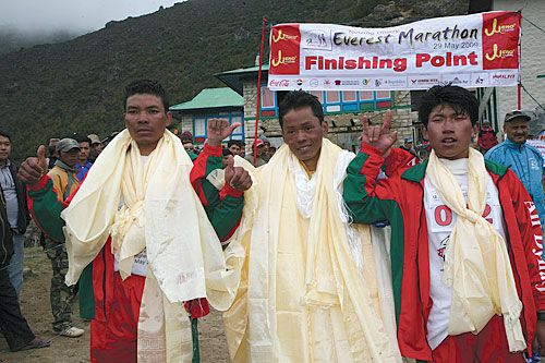 RUNNING MATES: Ram Kumar Tamang, Furba Tamang and Sudeep Kulung celebrate winning theTenzing Hillary Everest Marathon 2009 last week.