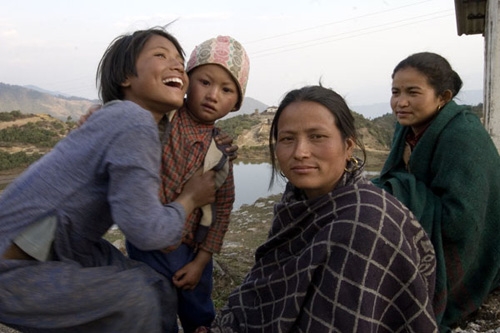 HOPEFUL: 32 year old Manju Shrestha (second from right) says she is voting tomorrow to ensure a more secure future with proper laws for her children.
