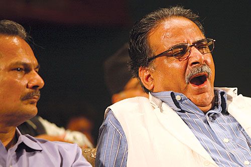 SLEEPY HEAD: Maoist Chairman Puspa Kamal Dahal at a program to induct new party members on Sunday at the Academy Hall on Sunday.