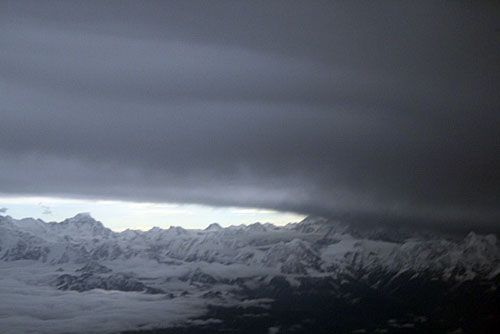 MOON SHADOW: Cho Oyu and Gyachung Kang in the penumbra of the total eclipse of the sun that grazed south-eastern Nepal on Wednesday morning. A large monsoon trough obscured Mt Everest, but brought welcome rain to central Nepal.
