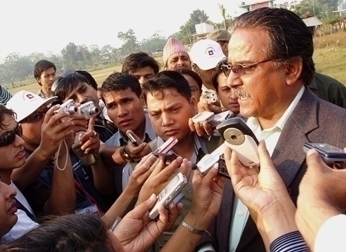 AMBUSHED: Pushpa Kamal Dahal is ambushed by media in Bharatpur after voting, his first time to cast a ballot since the referendum in 1980.