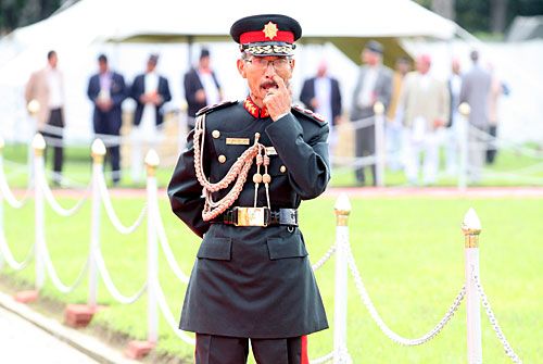 TRUSTY HANDS: Caretaker Army Chief Chattraman Gurung mills about at Tribhuvan International Airport on Saturday as he waits for the prime minister to return from his five-day visit to India.