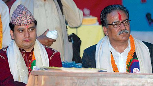 DIVINE REVOLUTION: Maoist chairman Pushpa Kamal Dahal at a prayer vigil organised by preacher Dinabandhu Pokhrel at Kapan on Tuesday to raise money for a local school.