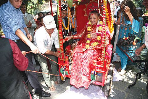 WHEN I AM 77: Founder of Dwarika's Hotel, Ambika Shrestha, in a ceremonial chariot at her jankhu that marked her reaching 77 years, 7 months, 7 weeks and 7 days on Tuesday.