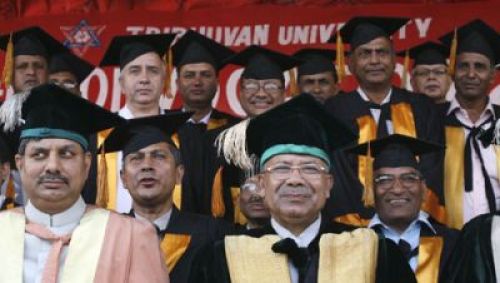 Prime Minister Madhav Kumar Nepal poses with Tribhuvan University officials during its 34th convocation ceremoney in Kirtipur.