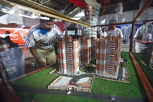 IF ONLY... A man observes a model of an upcoming apartment at the Nepal Property Expo at the Exhibition Hall on Sunday.