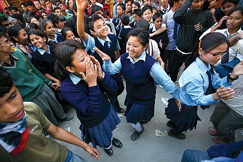 MAKING MERRY: School children dancing during a Maoist sit-in protest program at Kathmandu District Administration office on Wednesday.
