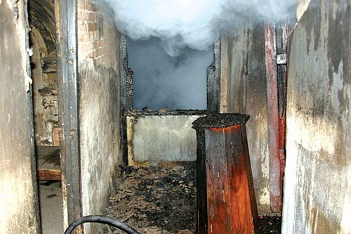 UP IN SMOKE: The charred interiors of Lal Darbar after an electrical short-circuit caused a fire on Tuesday that seriously damaged the building.