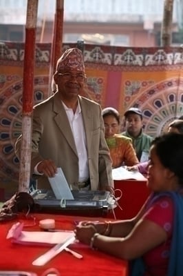 General Secretary of the Communist Party of Nepal (UML) Madhab Kumar Nepal casting his vote from Koteswor.