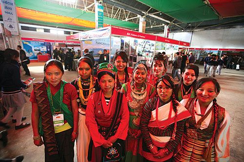 DIVERSITY: Women don traditional clothes from various districts during the Third National Tourist Fair 2066 in Bhrikutimandap on Tuesday.