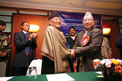 SUMMITEER: Prime Minister Madhav Kumar Nepal congratulates Min Bahadur Sherchan, who climbed Mount Everest at the age of 76 years and 340 days. The Guinness Book of World Records recently recognised him as the oldest man to have achieved the feat.