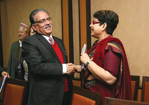 THAT'S SORTED THEN: Pushpa Kamal Dahal with UNSG Rep for Children and Armed Conflict Radhika Coomaraswamy after signing the action plan for the discharge of disqualified combatants.