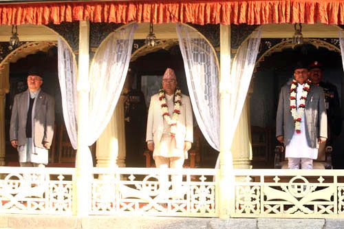 THREE WISE MEN: Speaker Subash Nembang, Prime Minister Madhav Kumar Nepal and President Ram Baran Yadav rise for the national anthem during a Saraswati Puja ceremony at Hanumandhoka on Wednesday.