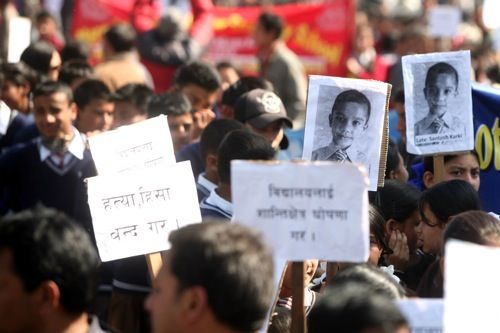 TAKE CARE: Students gather at New Baneshwor in Kathmandu on Tuesday demanding peace and security in their schools after 10-year-old Santosh Karki was shot dead in Gothaghar last week by gunmen with Maoists links.