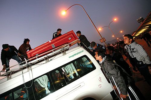 BACK HOME: The body of Krishna Lal Sharma arrives at TIA 18 months after he was killed in a road accident in Saudi Arabia, on Wednesday.