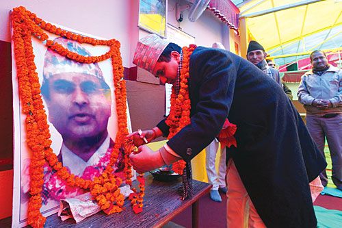 PAYING RESPECTS: Hindu preacher Dinbandhu Pokhrel pays homage to his late father and the first religious martyr Narayan Prasad Pokhrel during Martyr's Week at the World Hindu Federation on Sunday.