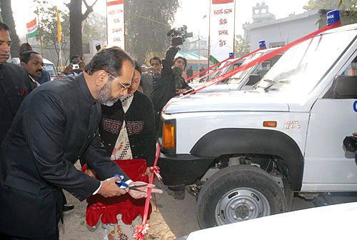 RED RIBBON: Indian Ambassador Rakesh Sood cuts a ribbon and presents 16 ambulances and six buses to several organisations to mark India's 61st Republic Day in Lainchaur on Tuesday.