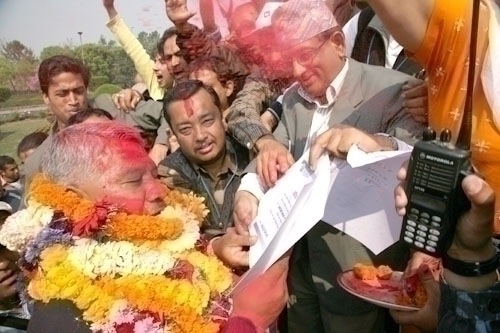 PAINTING HIM RED: Prakash Man Singh, the son of veteran NC freedom fighter Ganesh Man Singh was the first declared victor of the election, winning from Kathmandu-1.