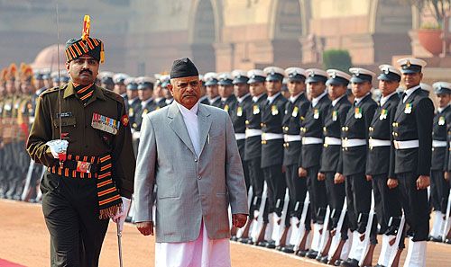 OUT AND ABOUT: President Ram Baran Yadav inspects an honour guard at Delhi's Presidential Palace on Tuesday during his four-day visit to India.