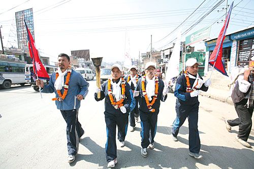 BLAZING TRAILS: Veteran marathoners participated in a peace torch rally on Wednesday to mark Nepal Tourism Year 2011. The torch was brought all the way from Lumbini.