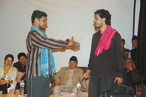 ONE NEPAL: Artists from Janakpur perform 'Sangor', a Maithili play about national unity, as CA Spokesperson Subhash Nembang watches at the Nepal Tourism Board Hall, Tuesday.