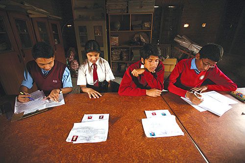 LIGHT AT THE END: Blind students Amala Maharjan and Raj Kumar Sadasankar sit for the School Leaving Certificate at Bal Binod Vaidya Ashram, Lalitpur on Thursday.