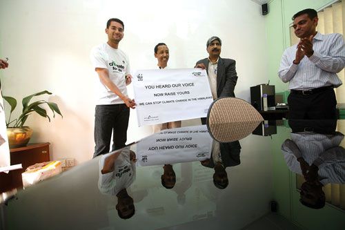 HIGH ESTEEM: Climate Ambassador Apa Sherpa receives a banner from WWF on Monday that he will take with him to Mount Everest, which he is attempting to summit for a record 20th time.