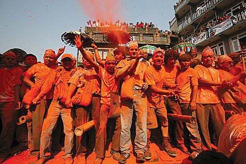 RED-FACED: Colour-smeared devotees on the occasion of Sindhur Jatra in Thimi on Thursday.