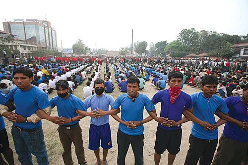 FLEX MUSCLES: Maoist cadre, who arrived in Kathmandu from across the country for the May Day showdown exercise in Lainchaur on Thursday morning.