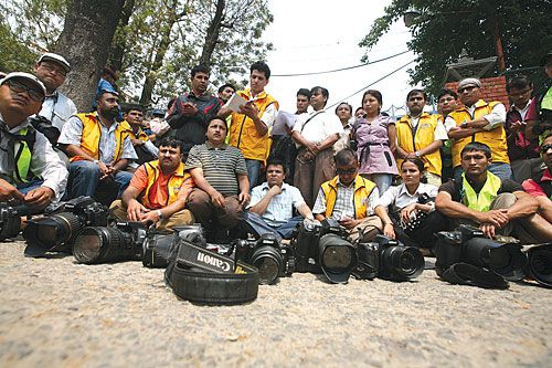 LIGHTS, CAMERA, NO ACTION: Mediapersons stage a sit-in protest at Ranipokhari police station after police baton-charged a group of photojournalists on Tuesday at Trichandra and Pashupati campuses.