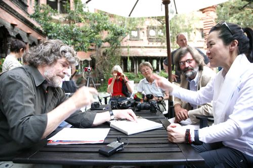 SHE DID IT: Tyrolean mountaineer Reinhold Messner endorses the climb of Kangchenjunga last year by Korean climber Oh Eun-sun in Kathmandu on Sunday. Oh became the first woman to climb all the world's 14 eight-thousand metre peaks when she climbed Annapurna on her second attempt two weeks ago. Messener had performed the same feat 24 years ago. Oh's Kangchenjunga ascent was thrown in doubt after some European mountaineers said she had stopped short of the real summit in bad weather.