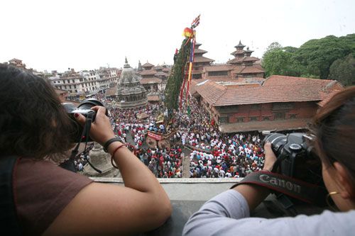 ON ITS WAY: After a month of being grounded, the Rato Machhindranath chariot is pulled along by devotees on the third day of its journey at Mangal Bajar, Wednesday.