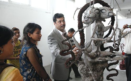 UNCOMMON ART: FNCCI chairman Kush Kumar Joshi with artist Sheelasha Rajbhandari at the latter's launch of In Between Uncommon Factors, Nepal Art Council, Babar Mahal, last Friday