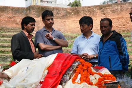 FAREWELL: Madan Krishna Shrestha and Hari Bansha Acharya pay their tribute to folk singer Tirtha Gandharva who passed away on Friday morning.