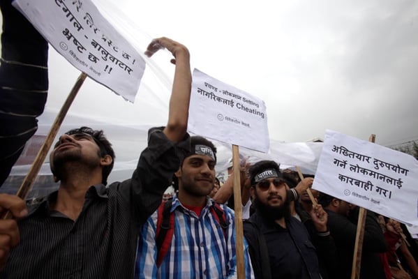 Youth stage a rally in Kathmandu on Saturday demanding a probe into a reported deal between Prime Minister Pushpa Kamal Dahal and the Commission for the Investigation of Abuse of Authority (CIAA) Chief Lokman Singh Karki. Dahal reportedly briefed his party that he has struck a deal with Karki, and the CIAA will not investigate Maoist leaders for allegedly swindling money released for ex-combatants.
