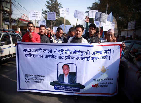 People participate in a rally to support Nepal Electricity Authority Managing Director Kulman Ghising at Bhrikutimandap on Saturday.