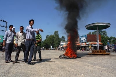 HIT AND GO: Students burn tyres in protest against a bus driver who ran over a student in Dhangadhi highway on Friday.