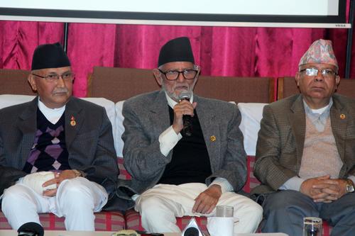 Prime Minister Sushil Koirala, along with KP Oli and Madhav Kumar Nepal attend a press conference at the Nepal Tourism Board hall on Sunday.
