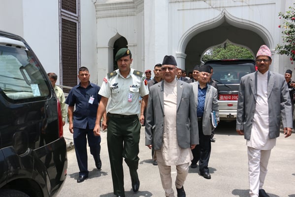 Prime Minister KP Oli visits Election Commission, Kantipath on Monday and instructs acting Chief Election Commissioner Ayodhi Prasad Yadav to prepare for local polls by December 2016.