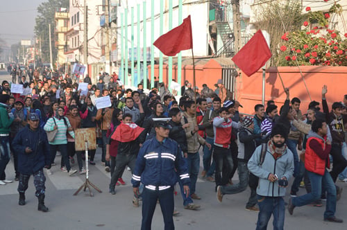 A protest rally organised at Bhrikuti Mandap in support of gang rape victim Puja Bohara demand the resignation of Minister of Law and Justice Narahari Acharya on Thursday.