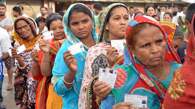 Voters in Chapkaiya in Birgunj wait in line to cast their votes in the third phase of local election on Monday.