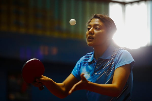 Winner of the Samjhana Open Table Tennis Tournament, Elina Maharjan of Nepal Police Club, serves ball during a match at Lainchaur on Sunday.