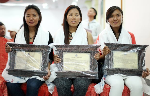 (L-R)Dawa Yangzum Sherpa, Maya Sherpa and Pasang Lhamu Sherpa, the first all-women team to scale K2, being felicitated by the Nepal Mountaineering Association.