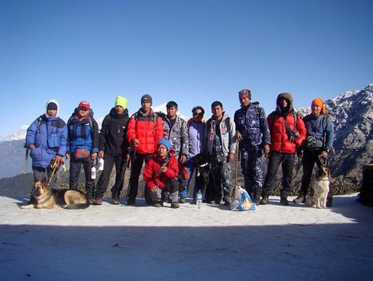 Karna Dura and his team with sniffer dogs from SAR Dogs Nepal at Bayali on Monday looking for Dennis Lee Thian Poh who disappeared on April 5, 2015.