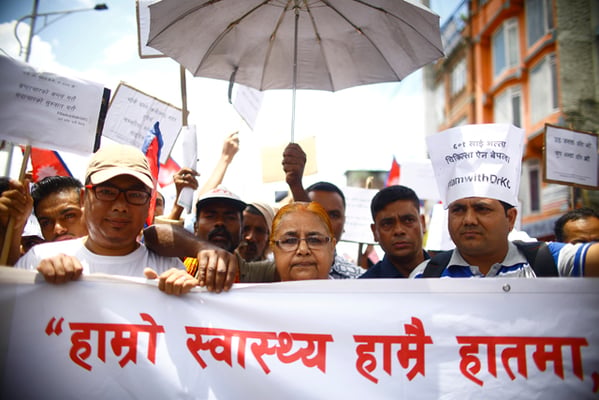 Former Chief Justice Sushila Karki participates in a rally in Kathmandu on Saturday to support Dr. Govinda KC's fast-unto-death, demanding reform in Nepal's medical education sector.
