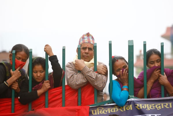 WALLED OFF: People who couldn't enter the Hupra Chaur grounds in Hetauda watch the UCPN(M)'s seventh general convention from outside on Saturday afternoon.