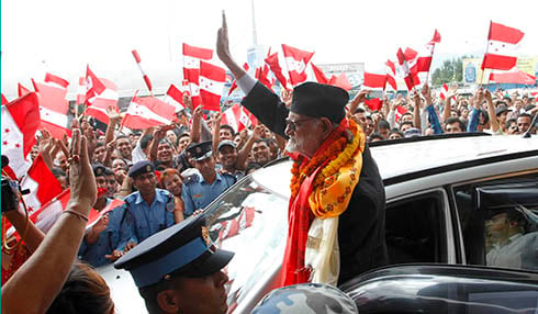 WELCOME: Nepali Congress President Sushil Koirala surrounded by NC supporters at Tribhuwan International Airport on Friday. Koirala returned home after six-day long India visit.